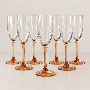 8 vintage champagneglas ”Pink Blush” från Luminarc, Frankrike. Klart glas med rosa/ambertonad fot och stjälk. Höjd ca 22 cm.